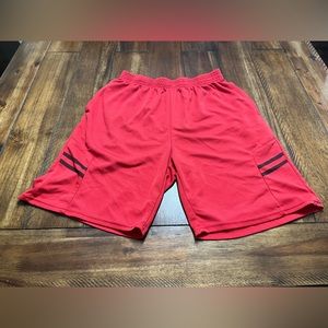 A pair of red and black athletic shorts.